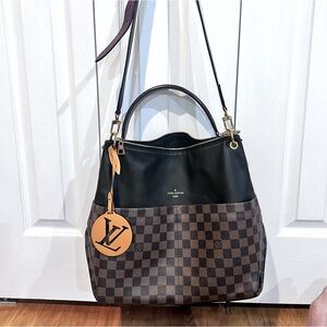 Louis Vuitton Damir design handles in red leather shoulder strap and arm strap